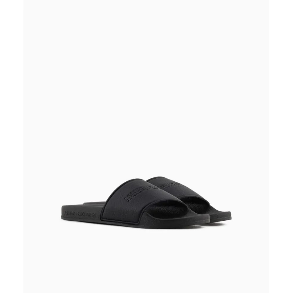 Armani Exchange Exchange Textured Open Toe Flat Slides in Black