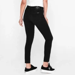 Calvin Klein Jeans Mid Rise Skinny Jeans in Black