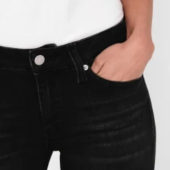 Calvin Klein Jeans Mid Rise Skinny Jeans in Black