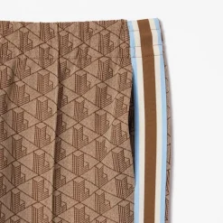 Lacoste Flared Monogram Sweatpants in Beige
