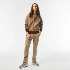 Lacoste Slim Fit L.12.12 Piqué Polo Shirt in Brown