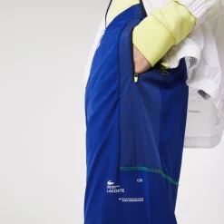 Lacoste Sport Zip Pockets Tapered Tracksuit Bottoms in Multi colour