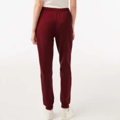 Lacoste Sporty & Rich Stretch Track Pants in Red