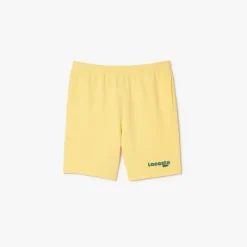 Lacoste Washed Effect Printed Fleece Shorts in Yellow