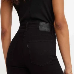 Levis 725 High Rise Bootcut Night Is Black Jeans in Black
