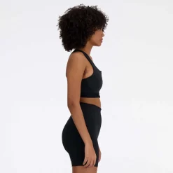 New Balance Sleek Medium Support Pocket Zip Front Sports Bra in Black