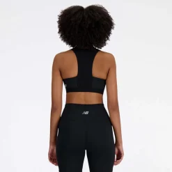 New Balance Sleek Medium Support Pocket Zip Front Sports Bra in Black