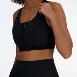 New Balance Sleek Medium Support Pocket Zip Front Sports Bra in Black